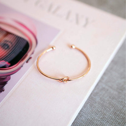Simple Opening Stainless Steel Twisted Flower Button Love Bracelet